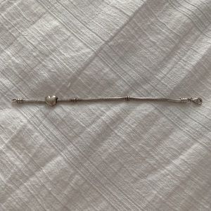 Pandora bracelet with heart charm